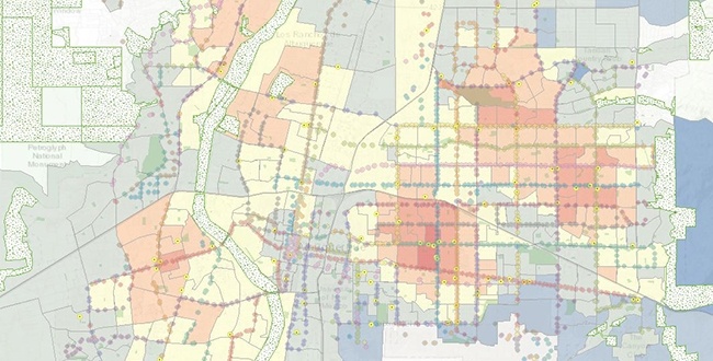 At a greater scale, spatial analysis reveals patterns that can inform site selection and ultimately quality of life. The above image shows Albuquerque’s grocery store density with public transportation and open space superimposed for context.