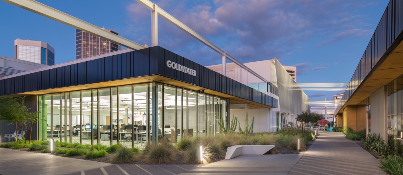 Phoenix architecture firm Dekker Perich Sabatini's Arizona office, lit at dusk.